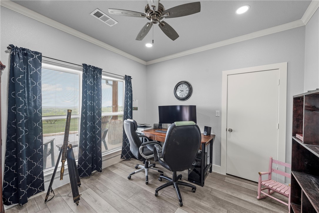 1227 Alexander Road Moody, TX 76557 - Photo 20 of 66 a view of a workspace with furniture and a window