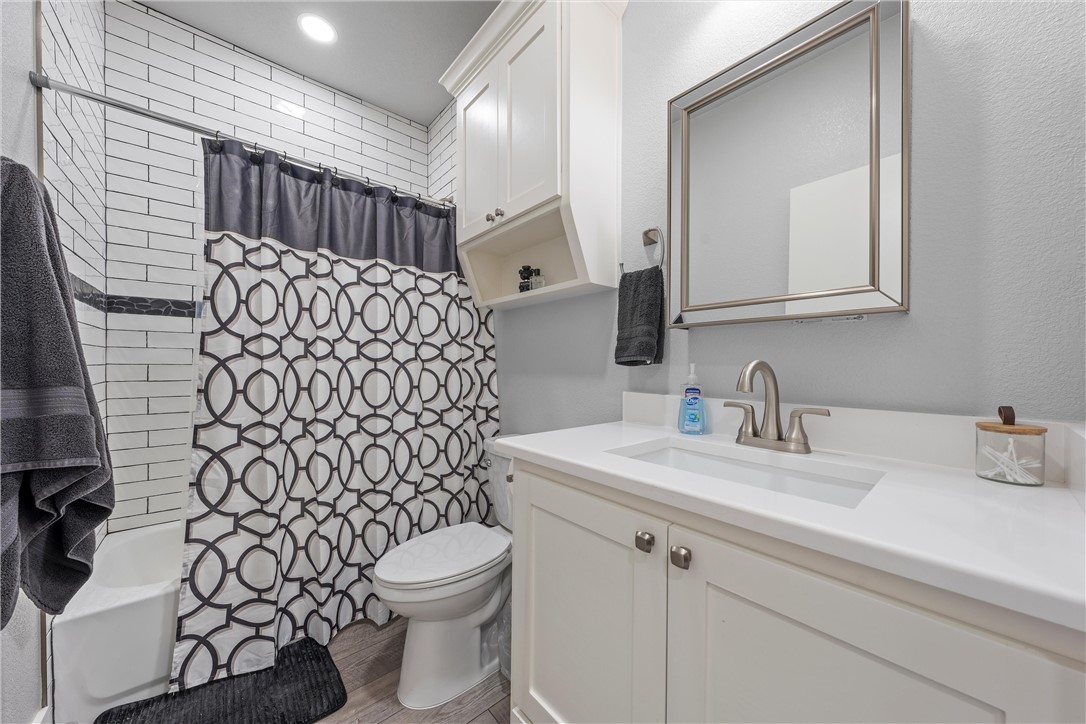 1227 Alexander Road Moody, TX 76557 - Photo 26 of 66 a bathroom with a sink toilet and shower