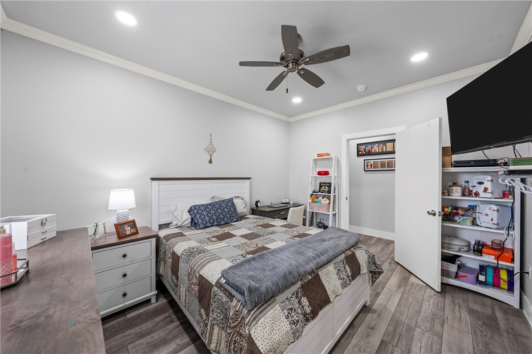 1227 Alexander Road Moody, TX 76557 - Photo 28 of 66 a bedroom with a bed and a flat screen tv