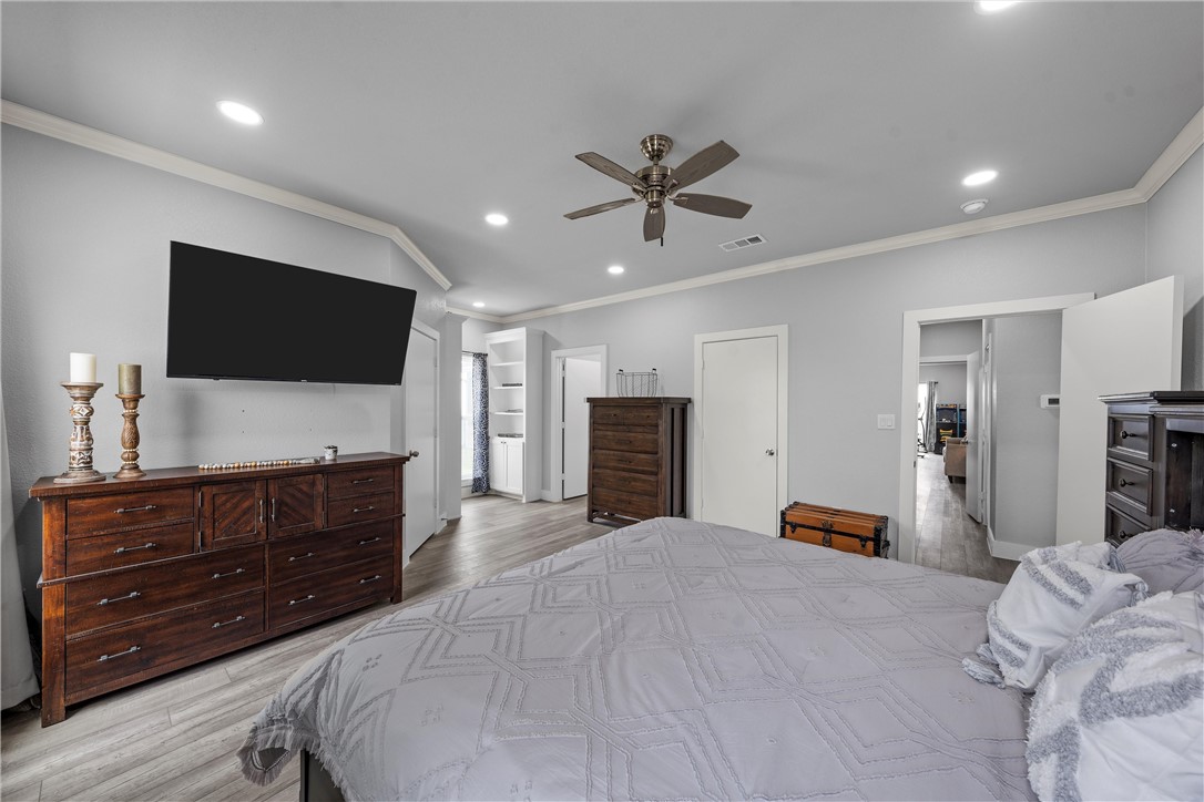 1227 Alexander Road Moody, TX 76557 - Photo 31 of 66 a bed room with furniture and a flat screen tv