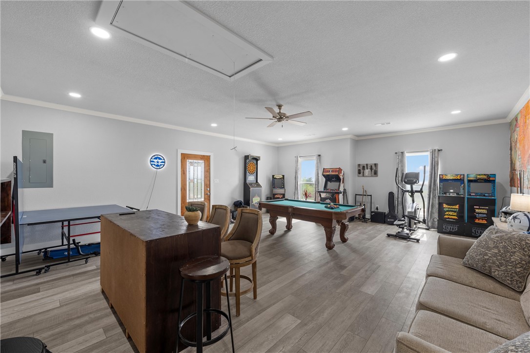 1227 Alexander Road Moody, TX 76557 - Photo 36 of 66 a living room with furniture a wooden floor and a table
