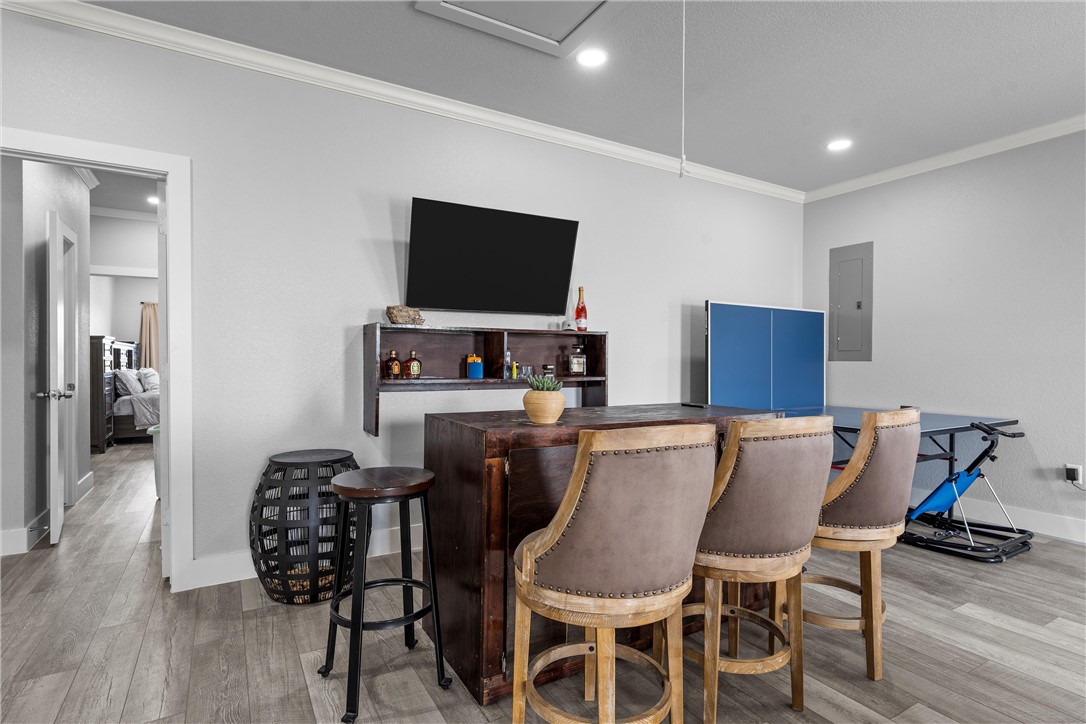 1227 Alexander Road Moody, TX 76557 - Photo 39 of 66 a dining room with furniture and wooden floor
