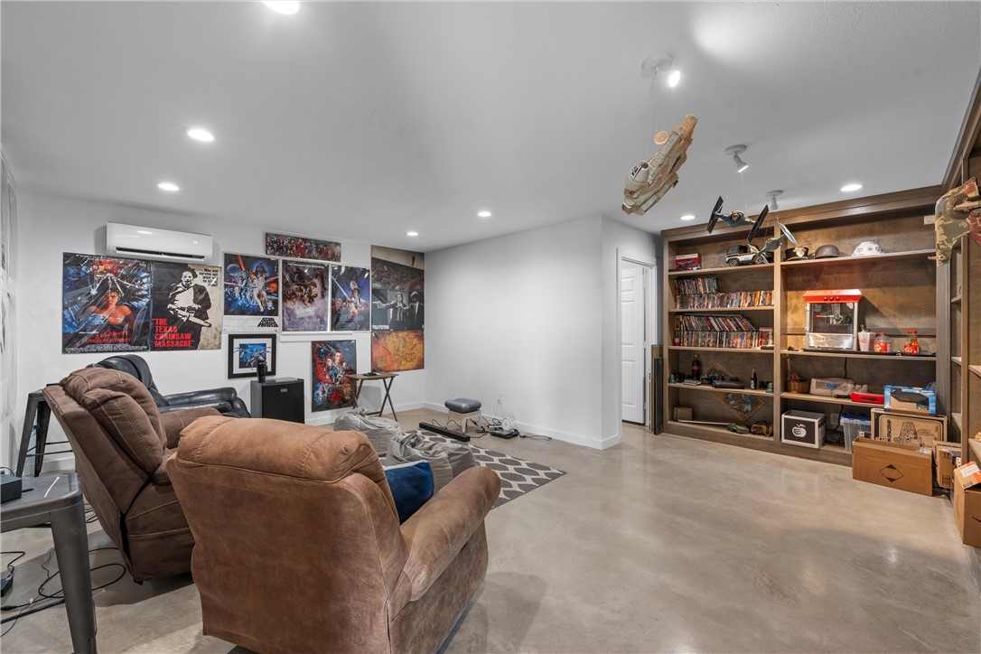 1227 Alexander Road Moody, TX 76557 - Photo 50 of 66 a living room with furniture and gym equipment