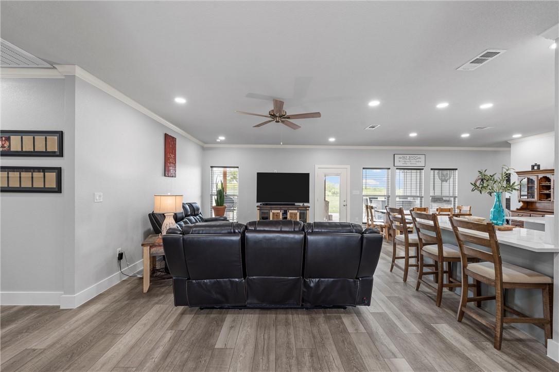 1227 Alexander Road Moody, TX 76557 - Photo 8 of 66 a living room with furniture and a wooden floor