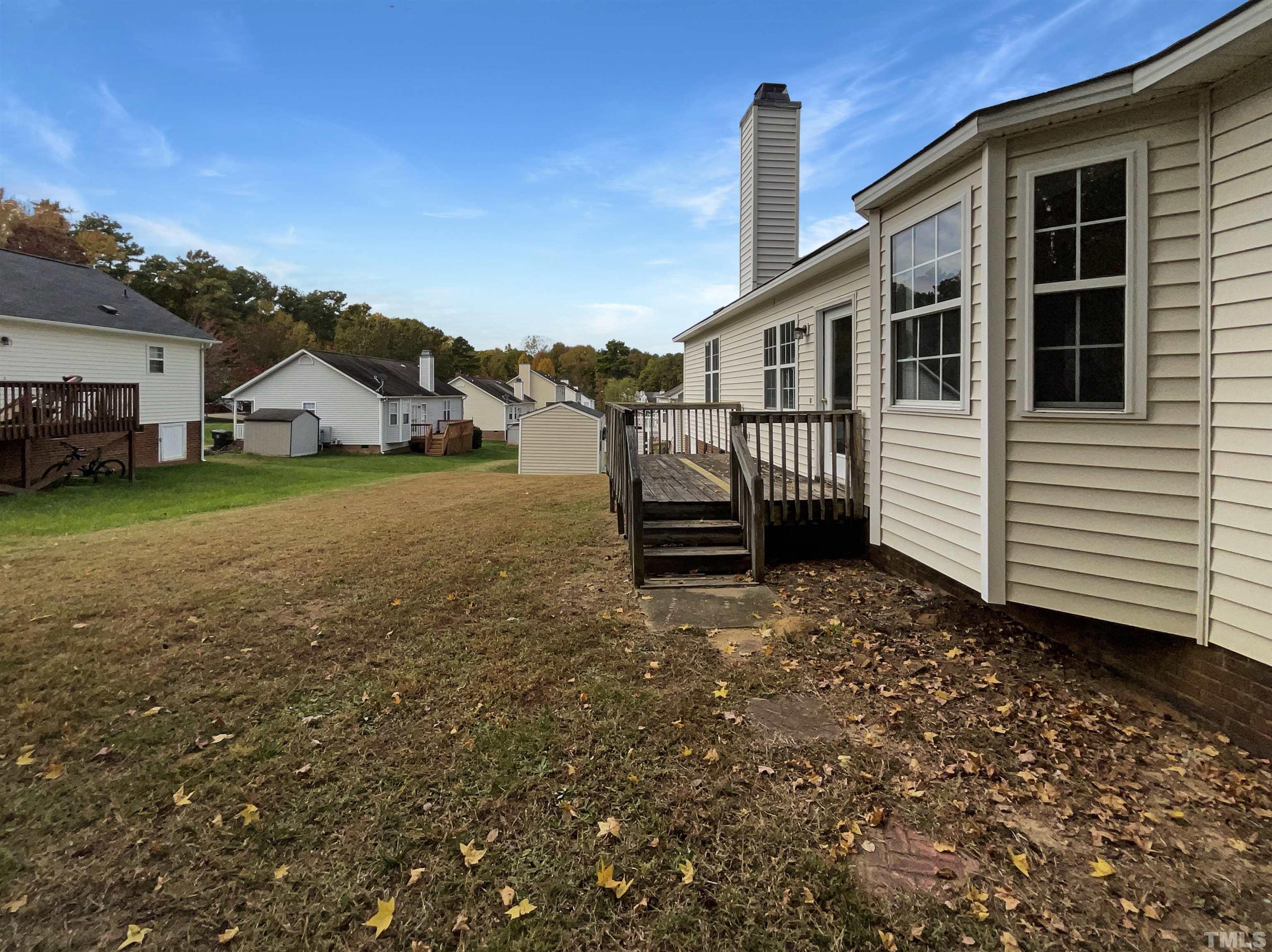 1105 Curtiss Drive Garner, NC 27529 - Photo 17 of 17 a view of a house with a yard
