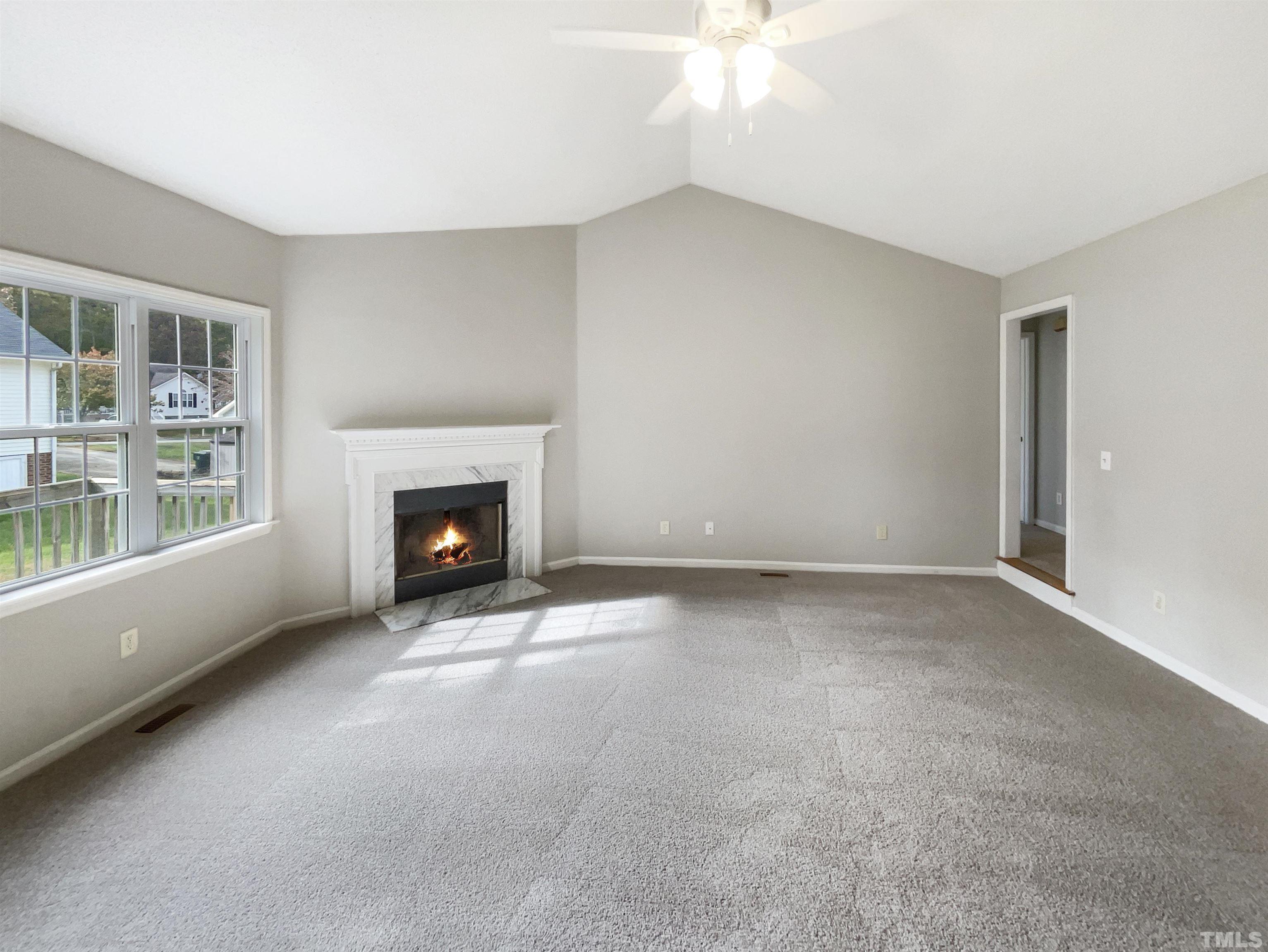 1105 Curtiss Drive Garner, NC 27529 - Photo 7 of 17 a view of an empty room with a window
