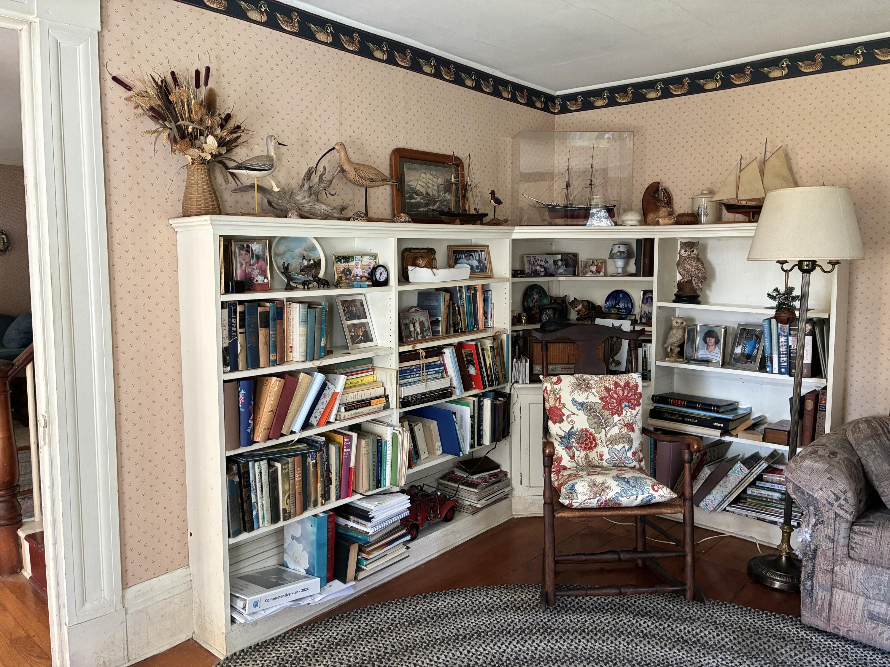 707 Newbury Neck Road Surry, ME 04684 - Photo 14 of 40 Built-ins in den corner.