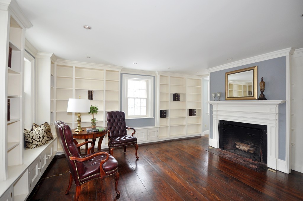 29 Lincoln Road Lincoln, MA 01773 - Photo 11 of 19 a living room with furniture and a fireplace