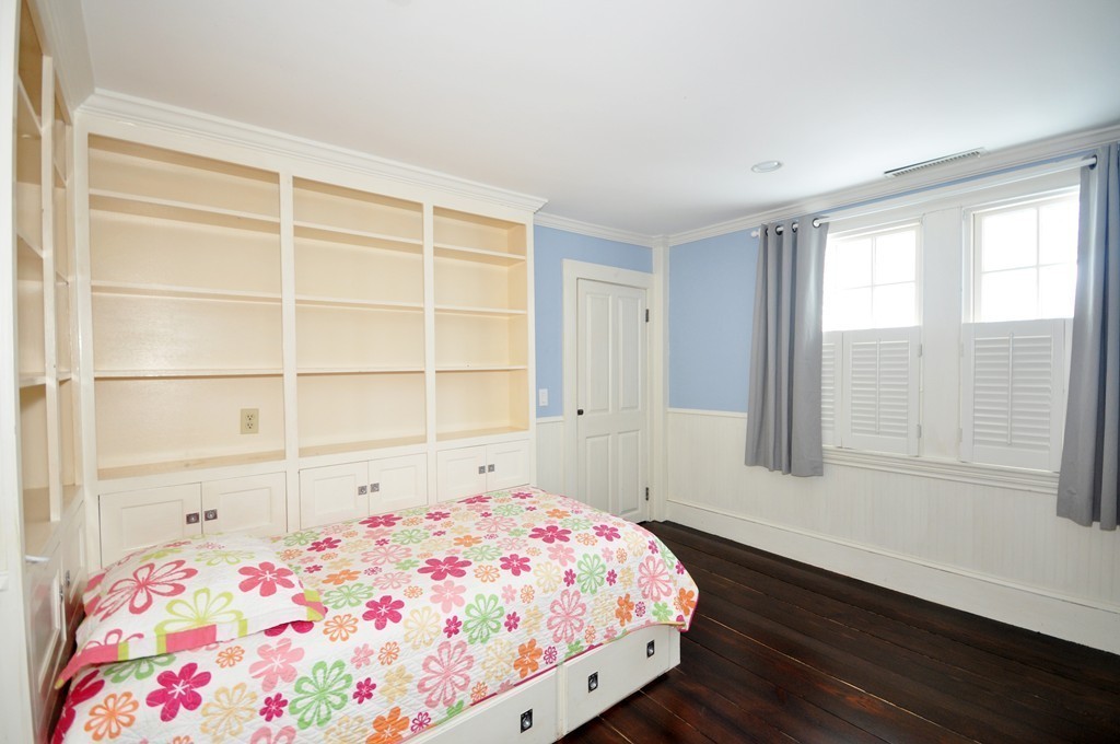 29 Lincoln Road Lincoln, MA 01773 - Photo 14 of 19 a bedroom with a bed and a window