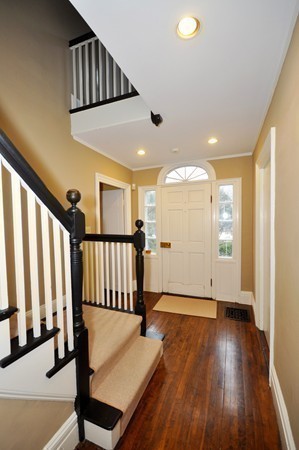 29 Lincoln Road Lincoln, MA 01773 - Photo 4 of 19 a view of a hallway with wooden floor and staircase