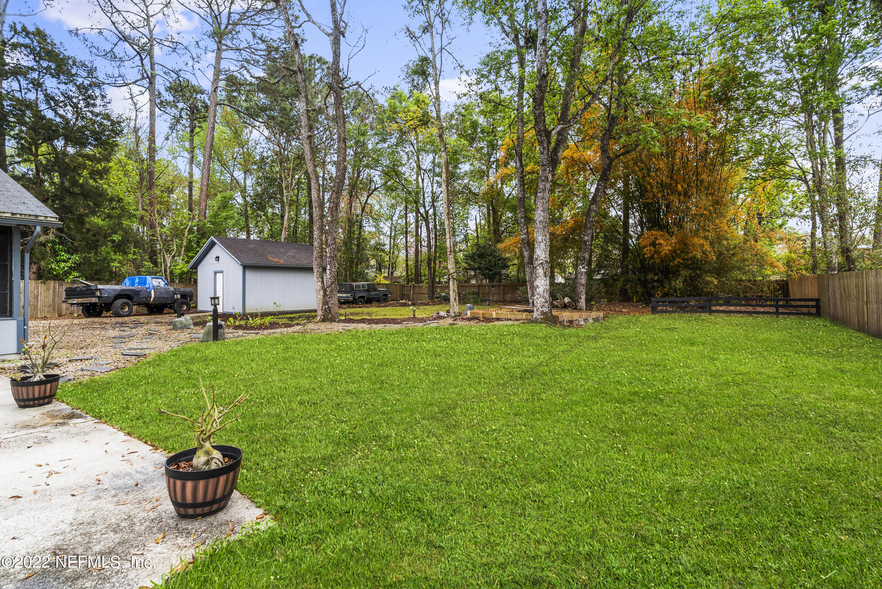 288 West Shores Road Fleming Island, FL 32003 - Photo 3 of 36 a view of a house with a yard porch and sitting area
