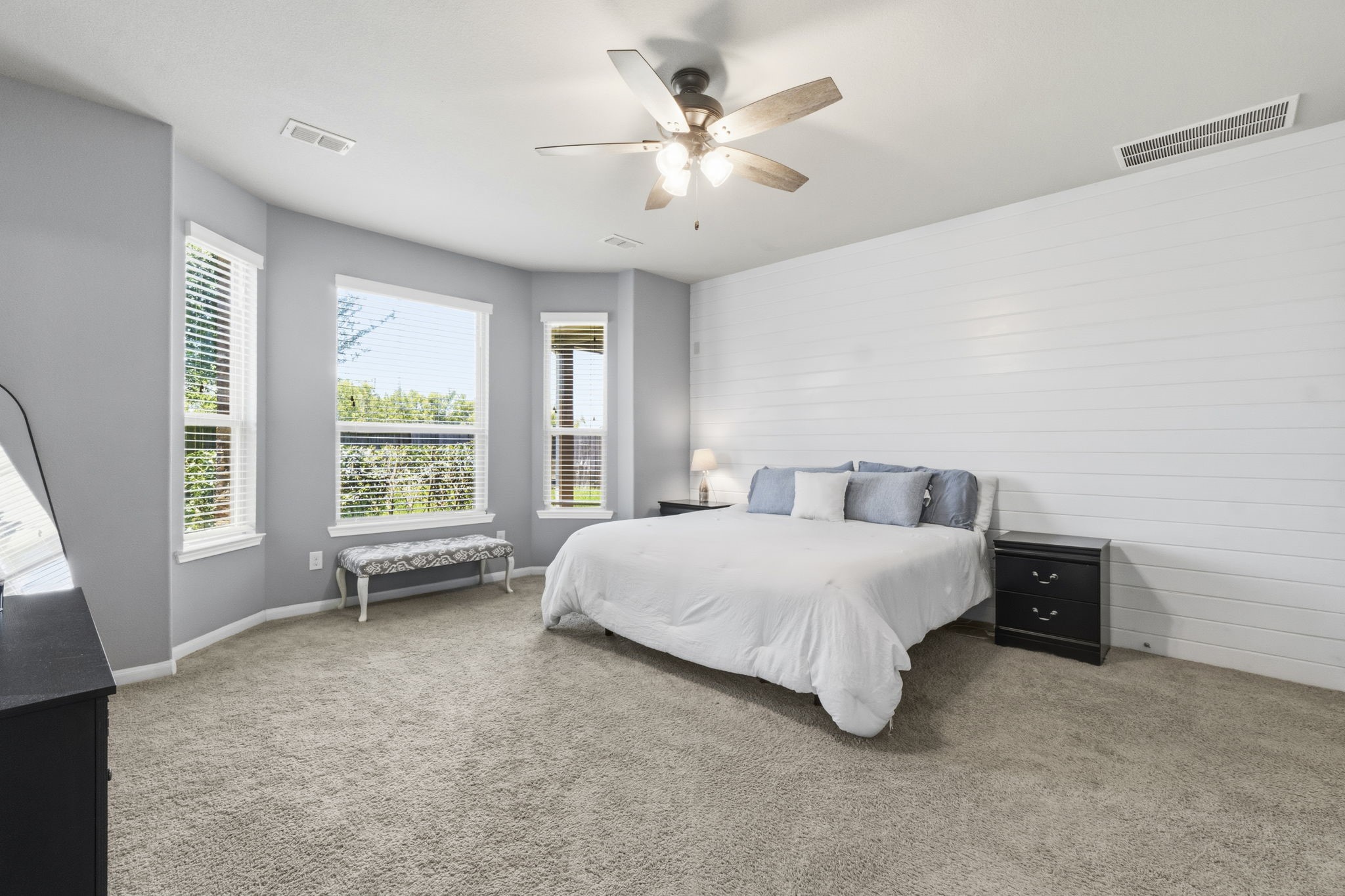3900 Enchanted Timbers Lane Spring, TX 77386 - Photo 19 of 49 a spacious bedroom with a bed and a large window