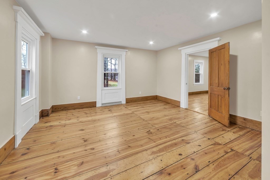 1385 Lyon Street Ludlow, MA 01056 - Photo 19 of 35 a view of empty room with wooden floor