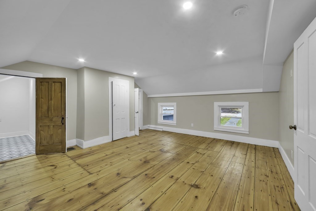 1385 Lyon Street Ludlow, MA 01056 - Photo 24 of 35 a view of empty room with wooden floor and fan