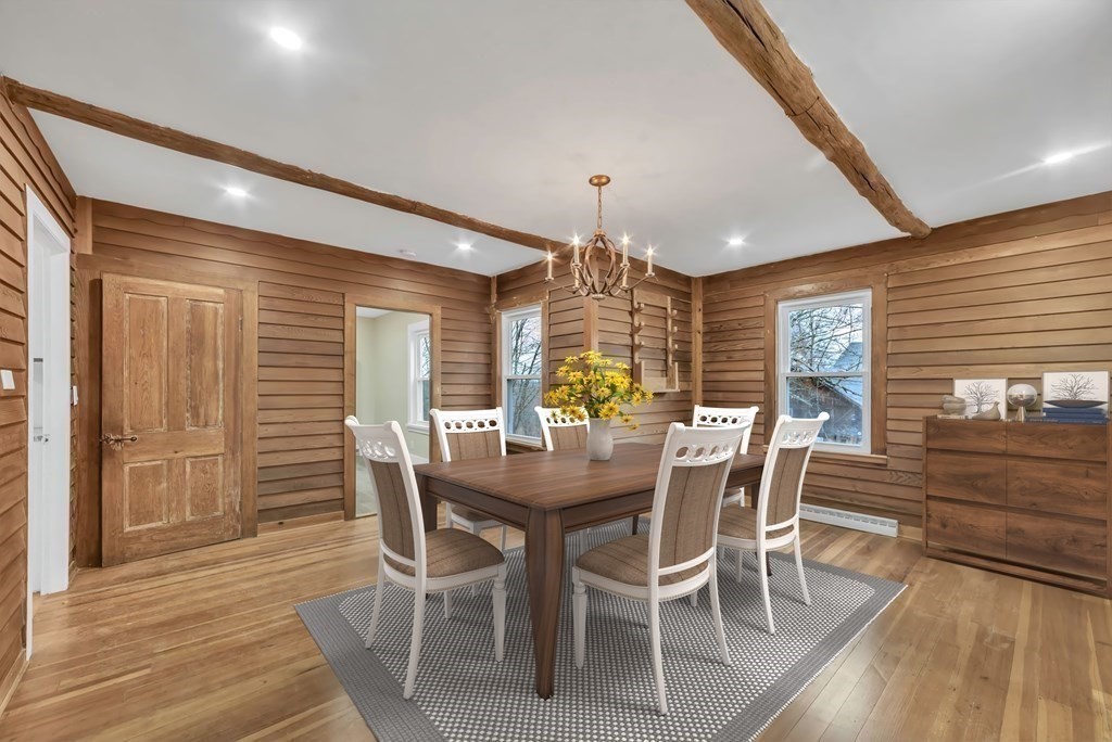 1385 Lyon Street Ludlow, MA 01056 - Photo 10 of 35 a view of a dining room with furniture window and wooden floor