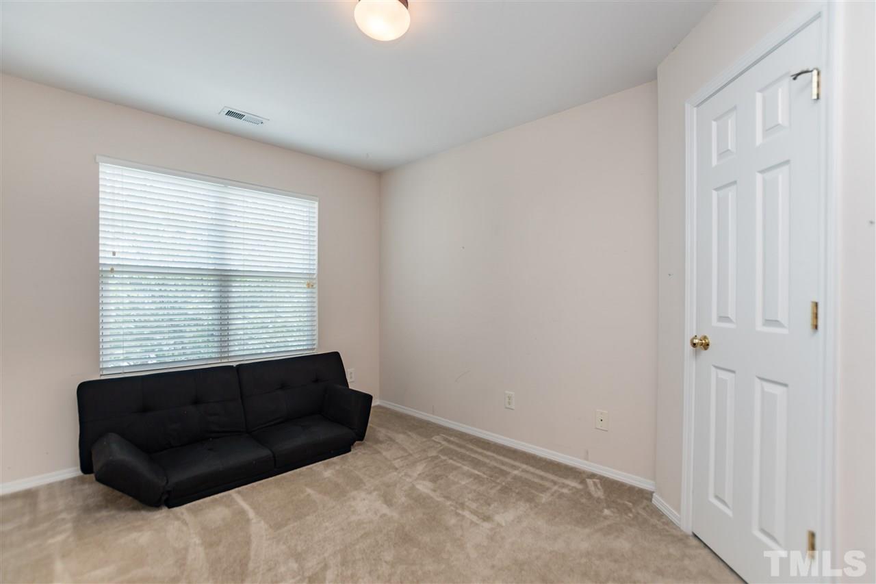 8313 Rubblestone Path Raleigh, NC 27613 - Photo 20 of 25 a view of empty room with a window