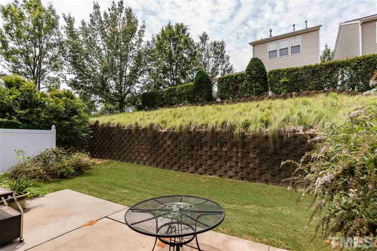 8313 Rubblestone Path Raleigh, NC 27613 - Photo 23 of 25 a view of a backyard