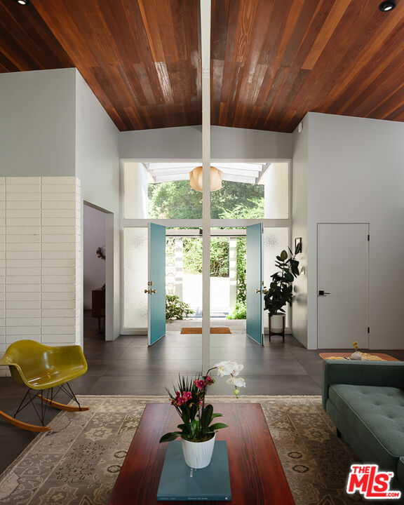 1540 Lancashire Place Pasadena, CA 91103 - Photo 2 of 31 a living room with furniture and a chandelier