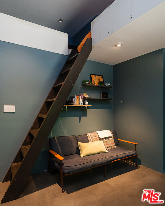1540 Lancashire Place Pasadena, CA 91103 - Photo 25 of 31 a living room with furniture and stairs