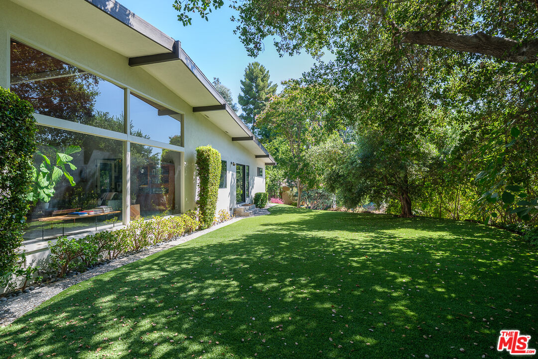1540 Lancashire Place Pasadena, CA 91103 - Photo 28 of 31 a view of a house with a yard and sitting area