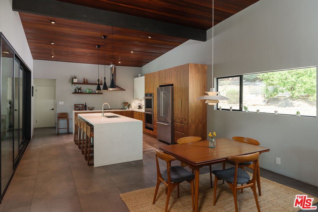 1540 Lancashire Place Pasadena, CA 91103 - Photo 10 of 31 a view of a dining room with furniture window and wooden floor