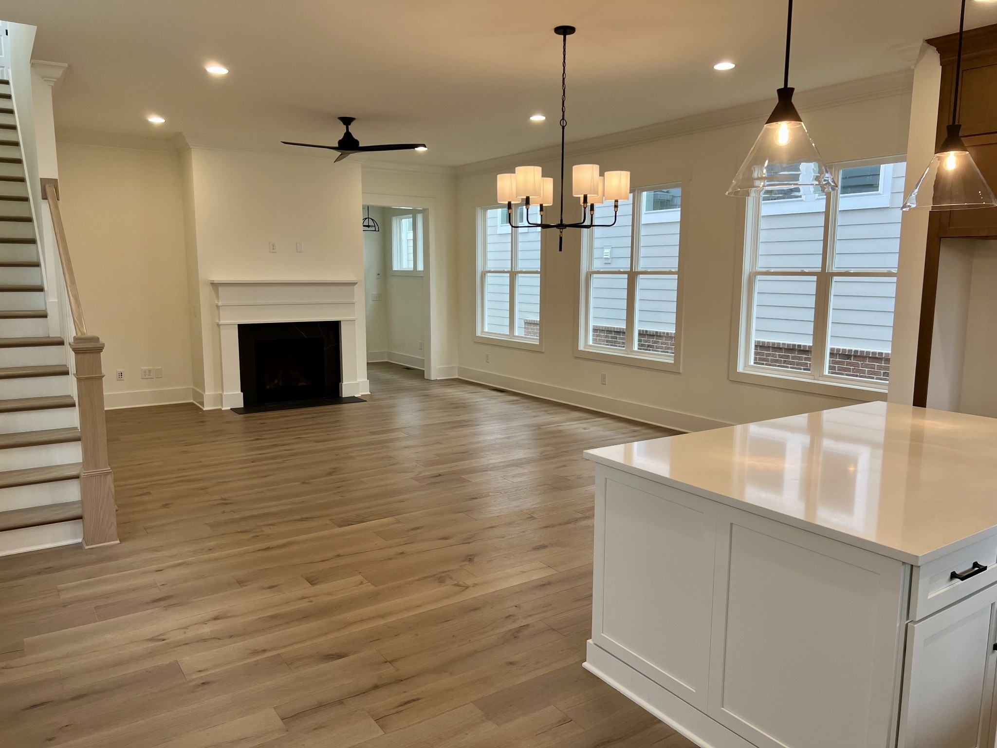 2007 Nathaniel Road Franklin, TN 37064 - Photo 2 of 12 a large kitchen with kitchen island a stove a sink a window and wooden floor