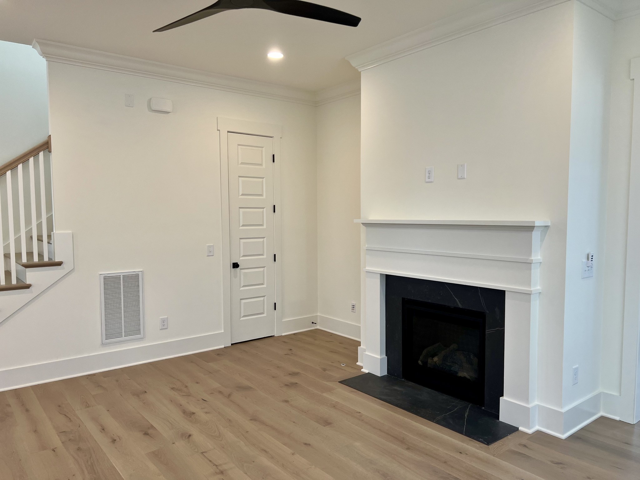 2007 Nathaniel Road Franklin, TN 37064 - Photo 3 of 12 a view of empty room with wooden floor and fireplace
