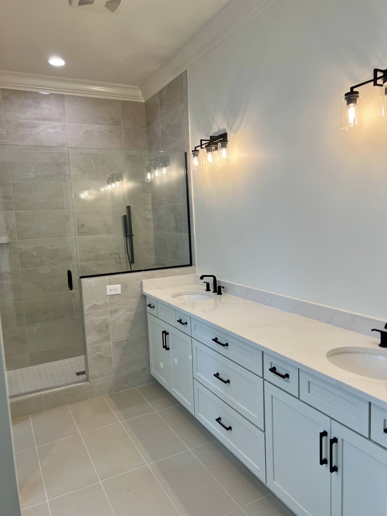 2007 Nathaniel Road Franklin, TN 37064 - Photo 7 of 12 a bathroom with a double vanity sink and a mirror