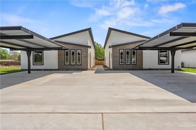 a very nice looking house with a outdoor space