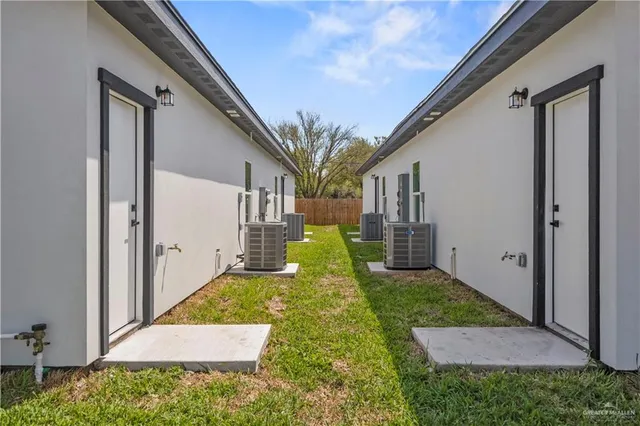 a view of a back yard of the house