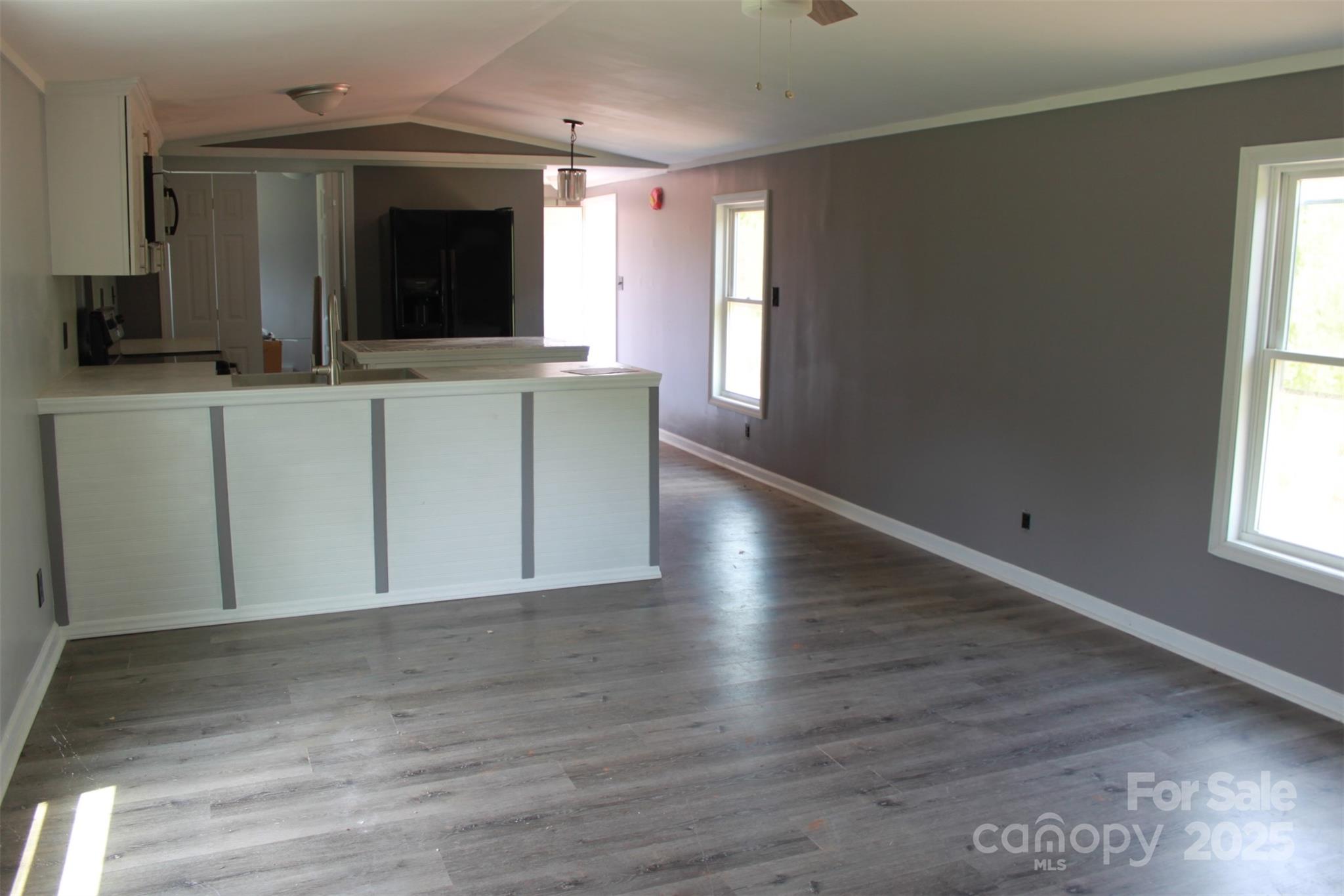 1316 Hopper Road Rutherfordton, NC 28139 - Photo 32 of 42 a view of a kitchen cabinets and a wooden floor