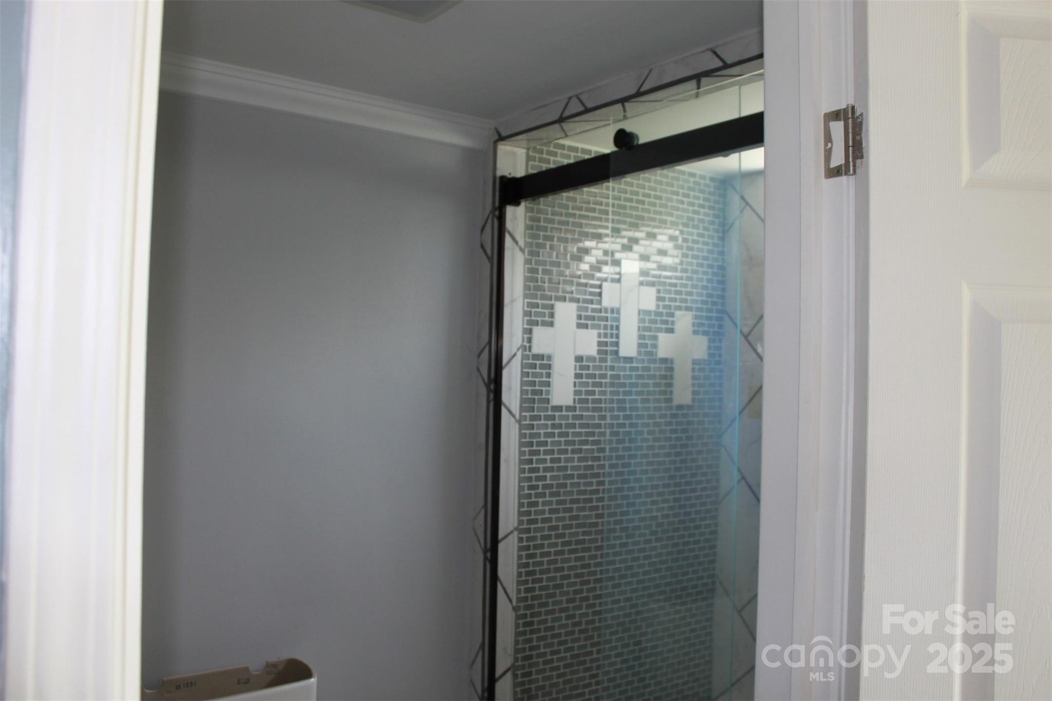 1316 Hopper Road Rutherfordton, NC 28139 - Photo 35 of 42 a bathroom with a shower and a window