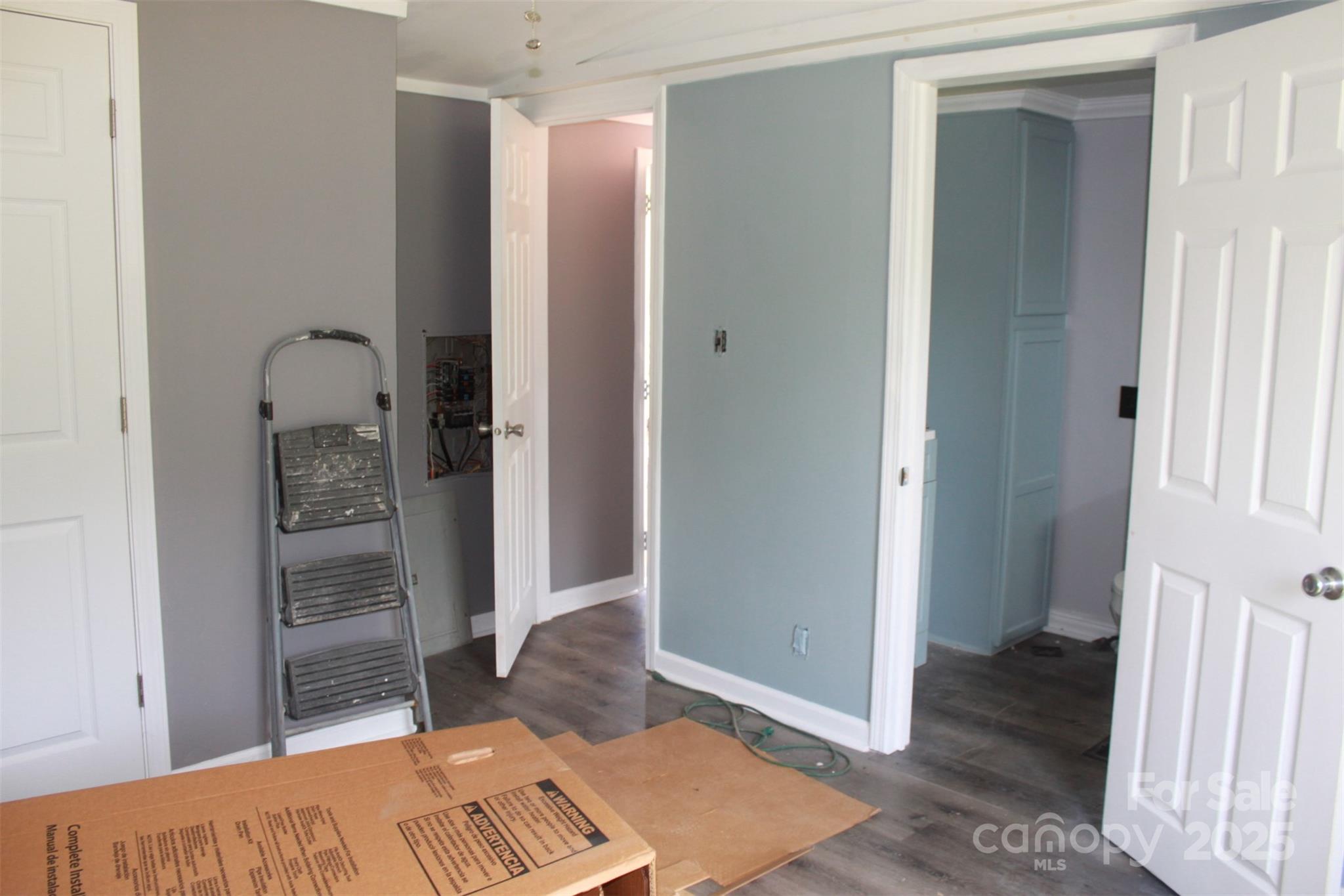 1316 Hopper Road Rutherfordton, NC 28139 - Photo 39 of 42 a bedroom with a bed and a walk in closet