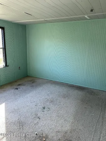 an empty room with a window