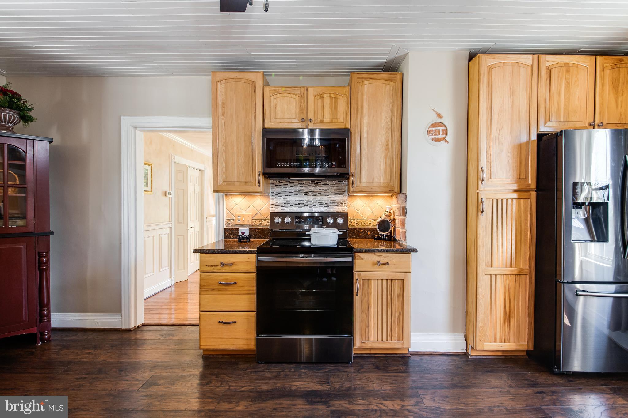 13920 Darnestown Road Gaithersburg, MD 20878 - Photo 14 of 44 Kitchen Leads to Family Room