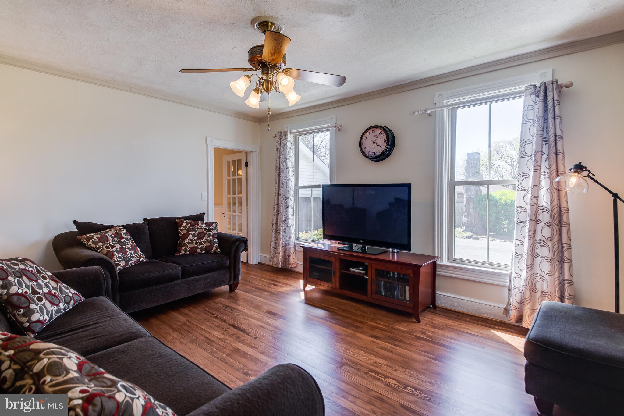 13920 Darnestown Road Gaithersburg, MD 20878 - Photo 8 of 44 Living Room Leads to Dining Room