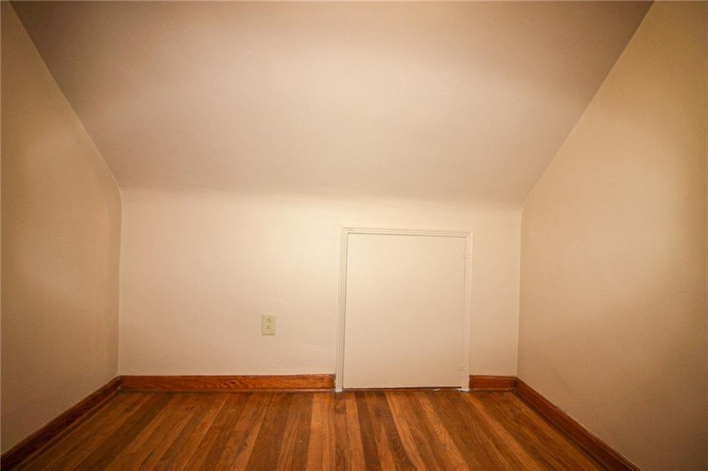 164 Gill Hall Road Clairton, PA 15025 - Photo 15 of 30 a view of a room with wooden floor