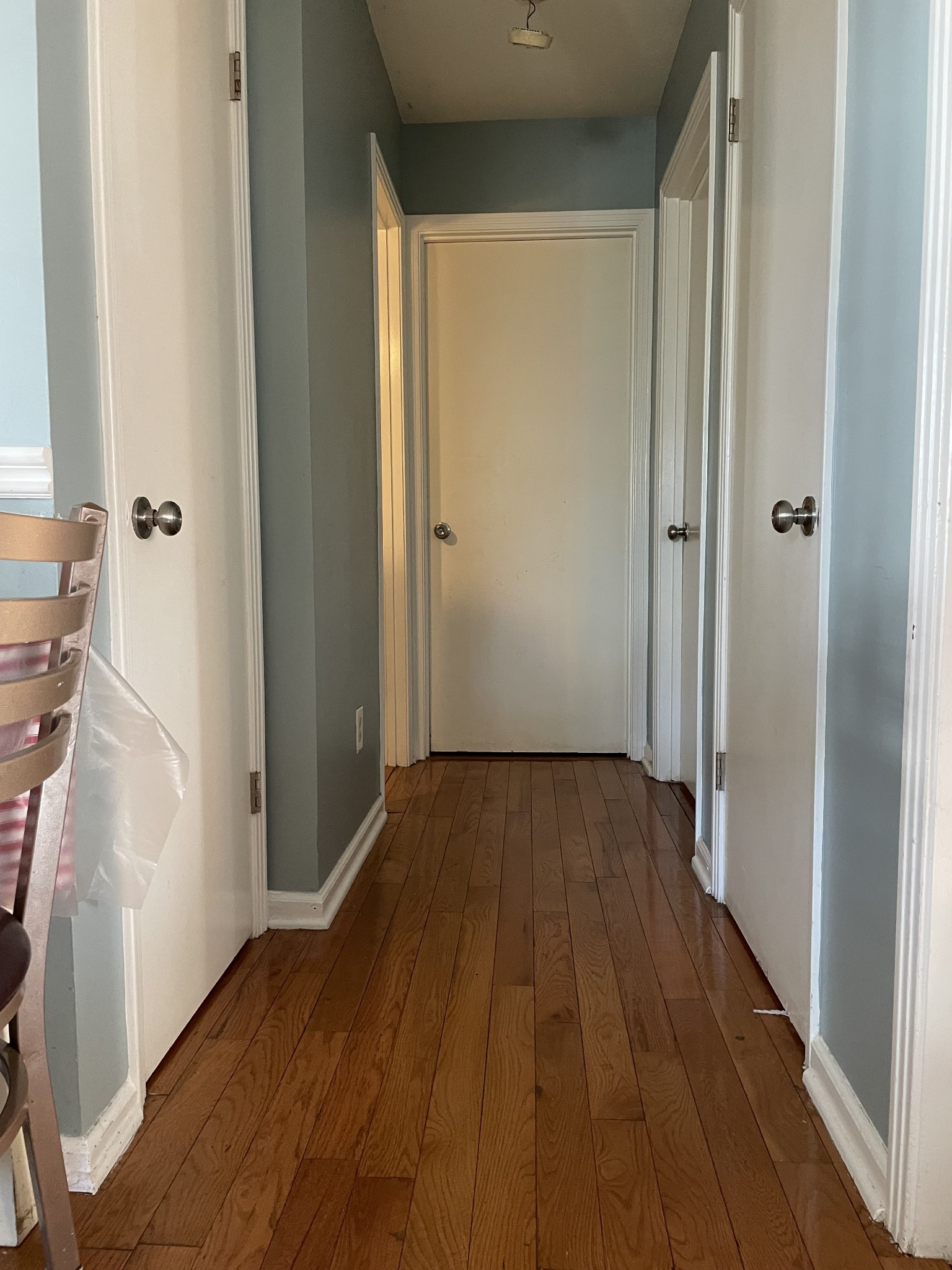 552 Piccadilly Row Antioch, TN 37013 - Photo 10 of 36 a view of a hallway with wooden floor and staircase