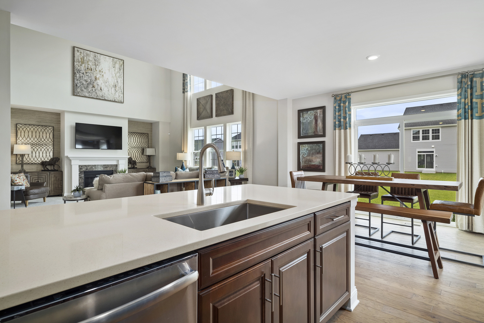 3648 Edelweiss Road Elgin, IL 60124 - Photo 18 of 32 a view of kitchen island a sink and living room