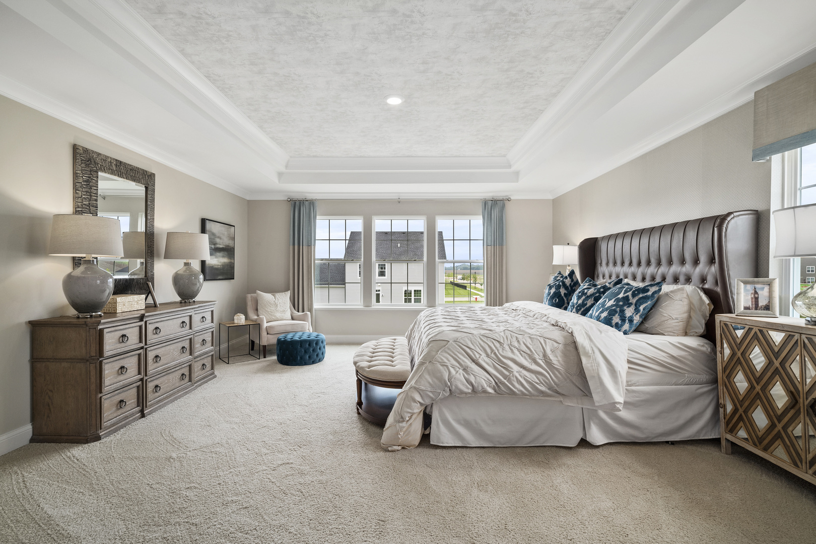 3648 Edelweiss Road Elgin, IL 60124 - Photo 24 of 32 a spacious bedroom with a bed a couch and large window