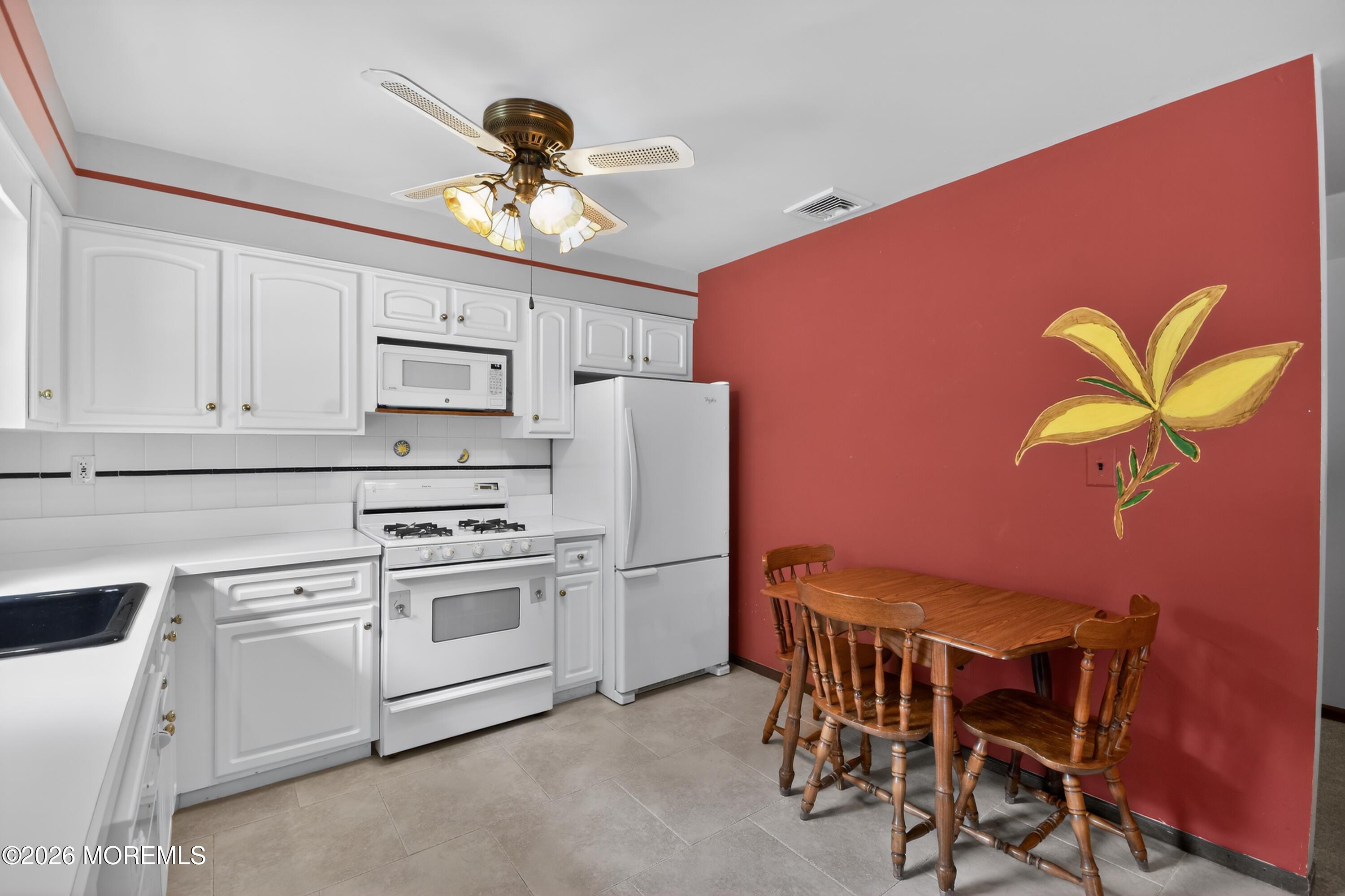 17 Point O Woods Road Middletown, NJ 07748 - Photo 38 of 60 32_17_Point_O_Woods_Rd-Kitchen-0130