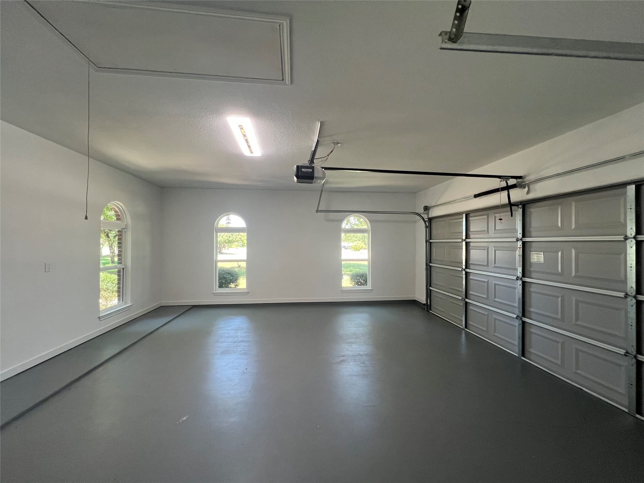 117 Cotton Rows Lane Taylor, TX 76574 - Photo 33 of 35 Attached garage with exopy floors