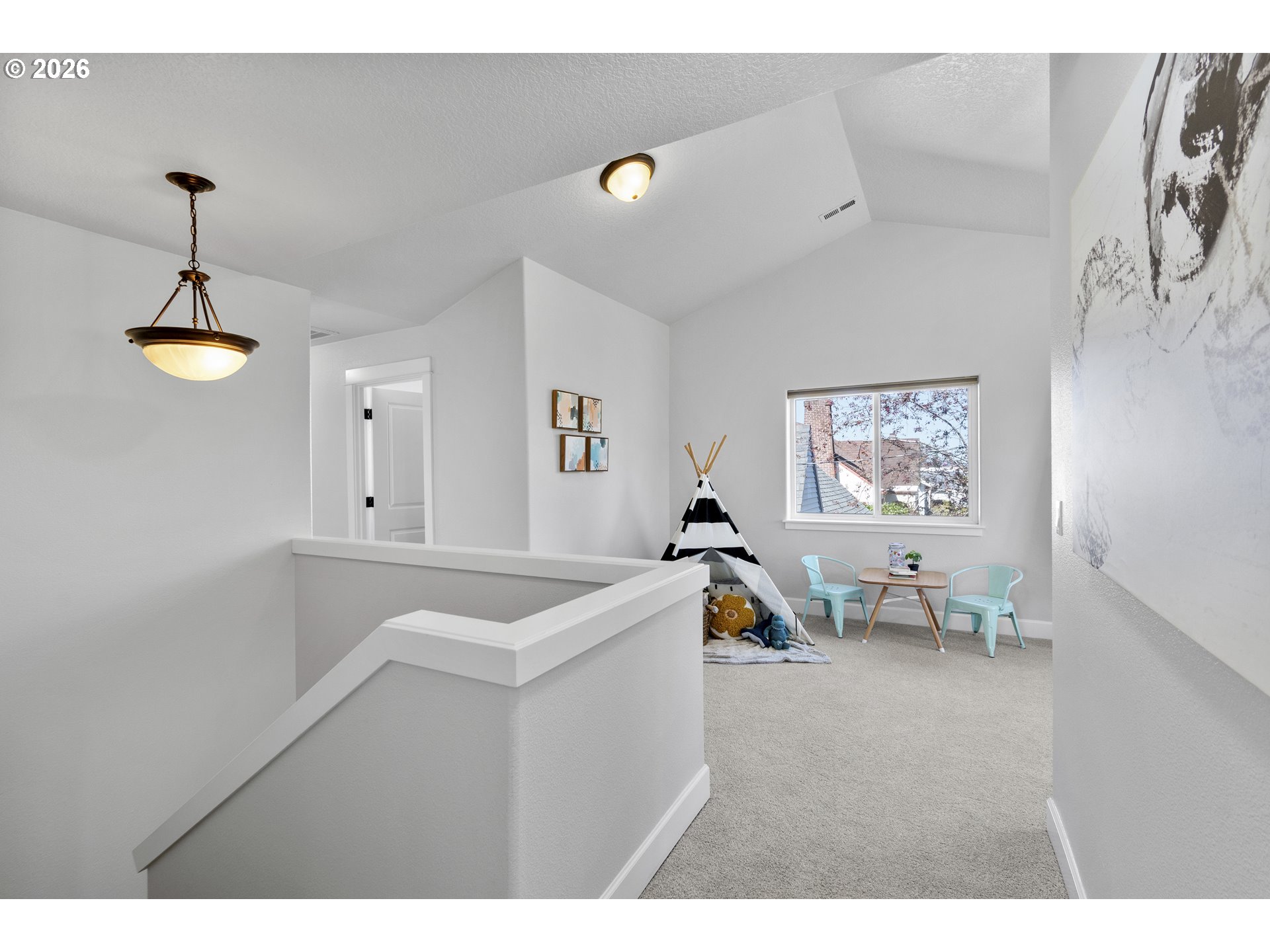 7473 Northeast Fremont Street Portland, OR 97213 - Photo 15 of 41 a view of living room with furniture and a chandelier