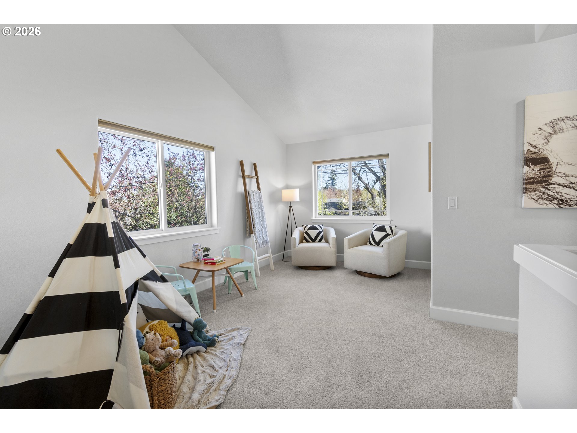 7473 Northeast Fremont Street Portland, OR 97213 - Photo 16 of 41 a living room with furniture and a large window