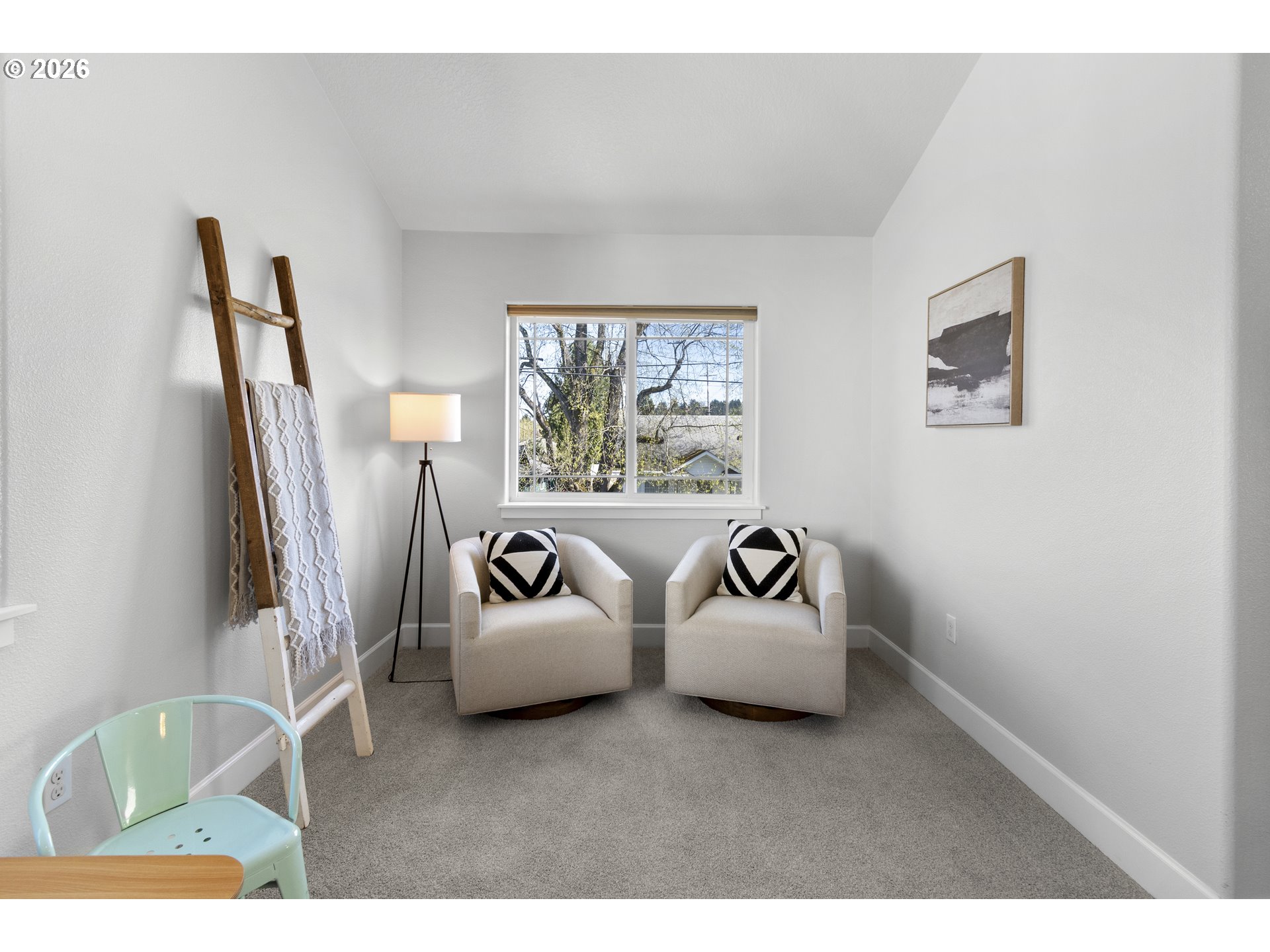 7473 Northeast Fremont Street Portland, OR 97213 - Photo 17 of 41 a living room with furniture and a window