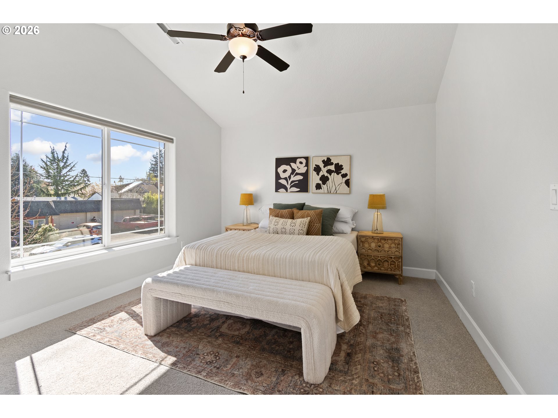 7473 Northeast Fremont Street Portland, OR 97213 - Photo 20 of 41 a bedroom with a bed and a window