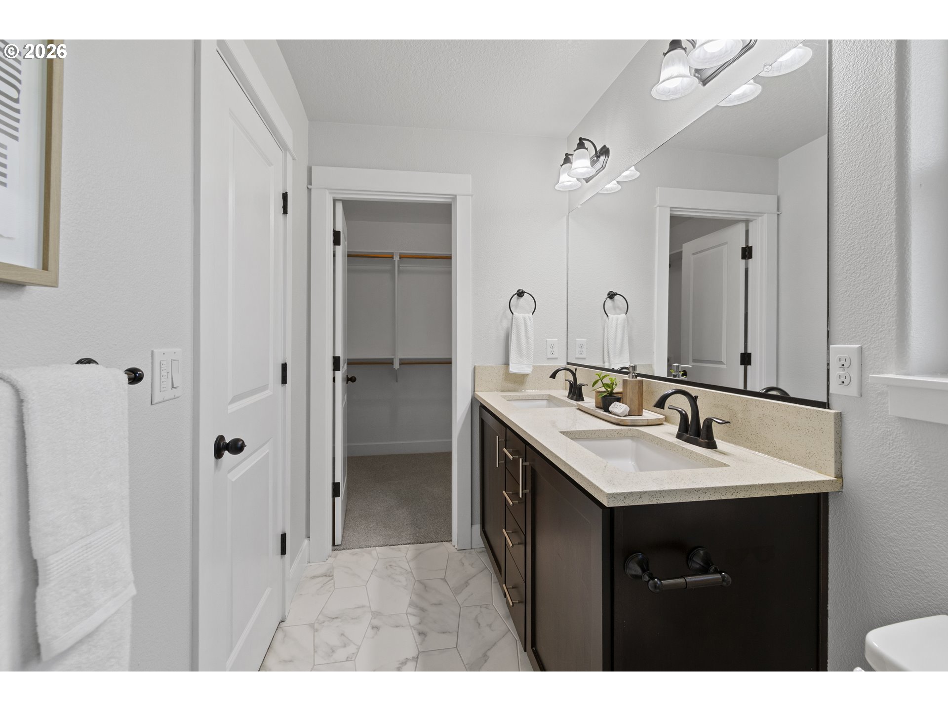 7473 Northeast Fremont Street Portland, OR 97213 - Photo 22 of 41 a bathroom with a sink vanity and a mirror