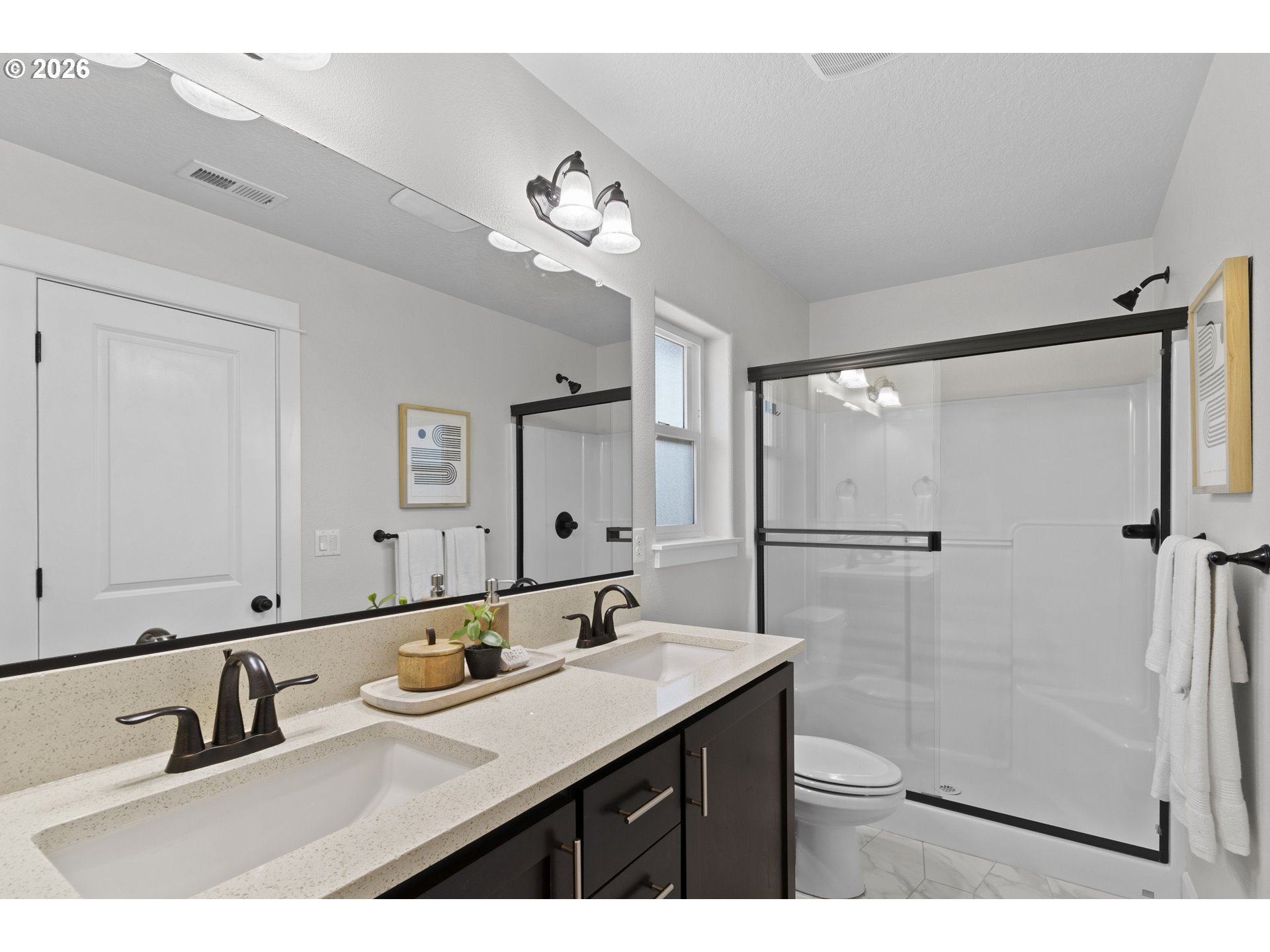 7473 Northeast Fremont Street Portland, OR 97213 - Photo 23 of 41 a bathroom with a sink and mirror