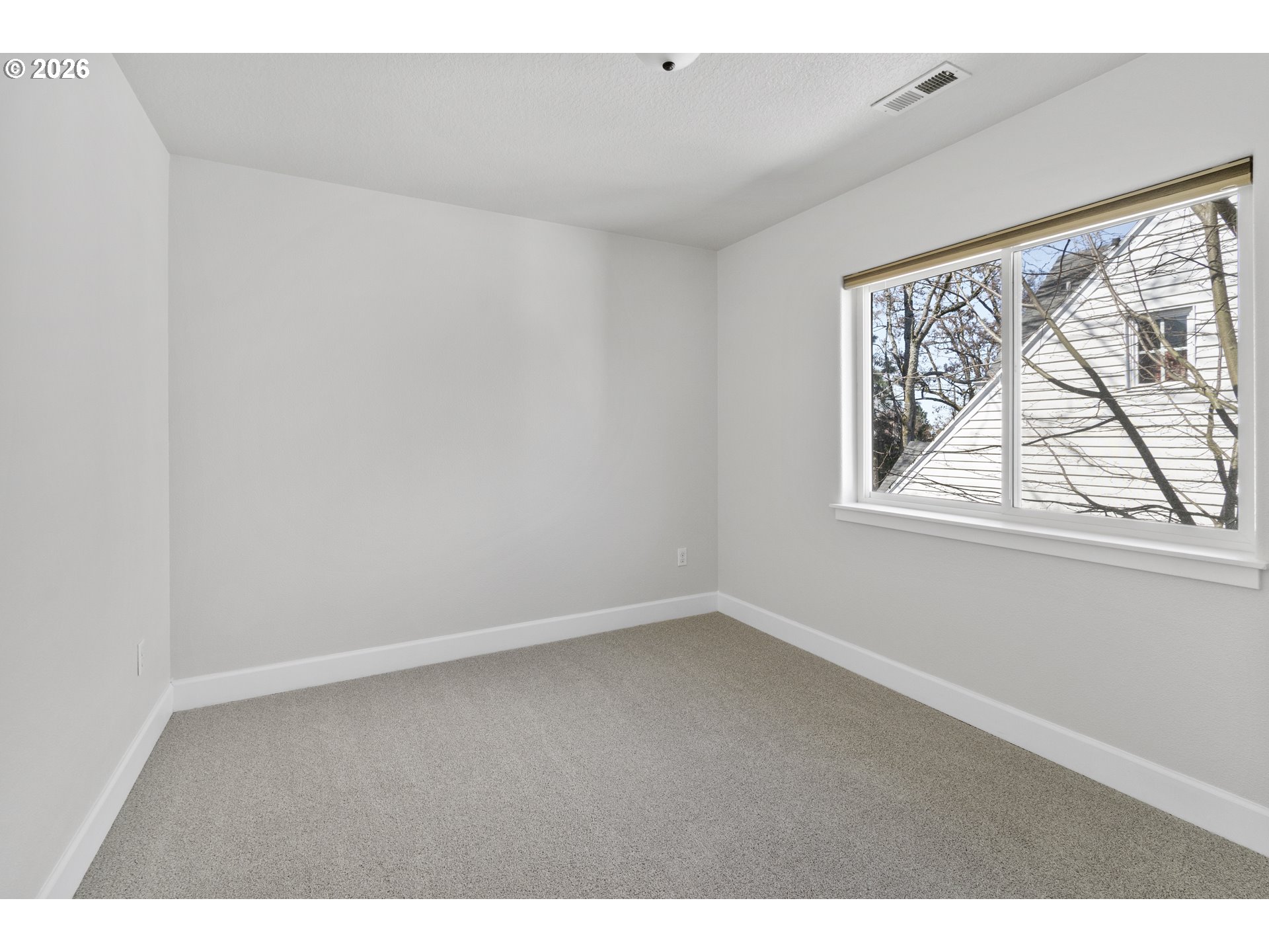 7473 Northeast Fremont Street Portland, OR 97213 - Photo 27 of 41 a view of an empty room with a window