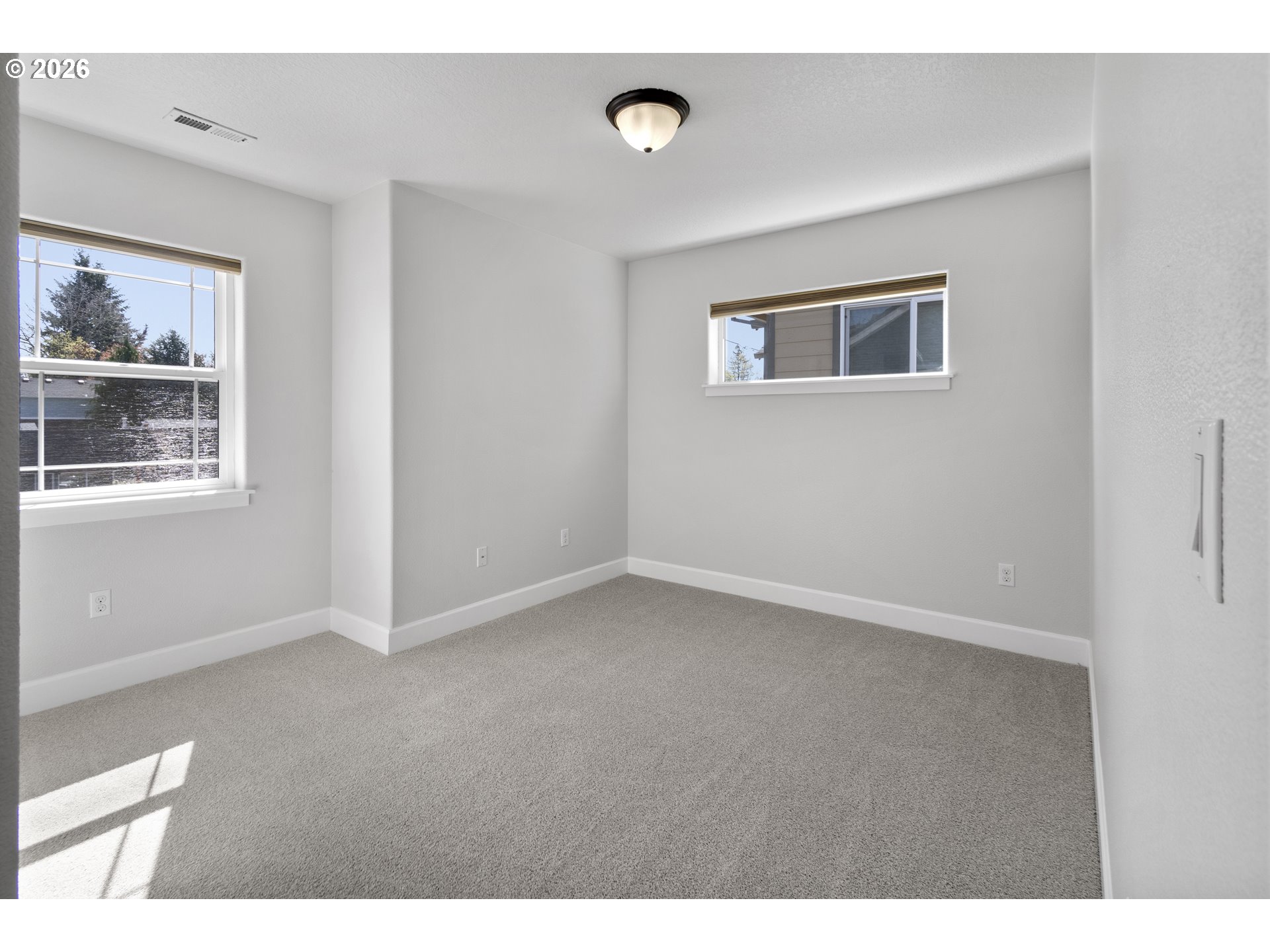 7473 Northeast Fremont Street Portland, OR 97213 - Photo 29 of 41 a view of an empty room with a window
